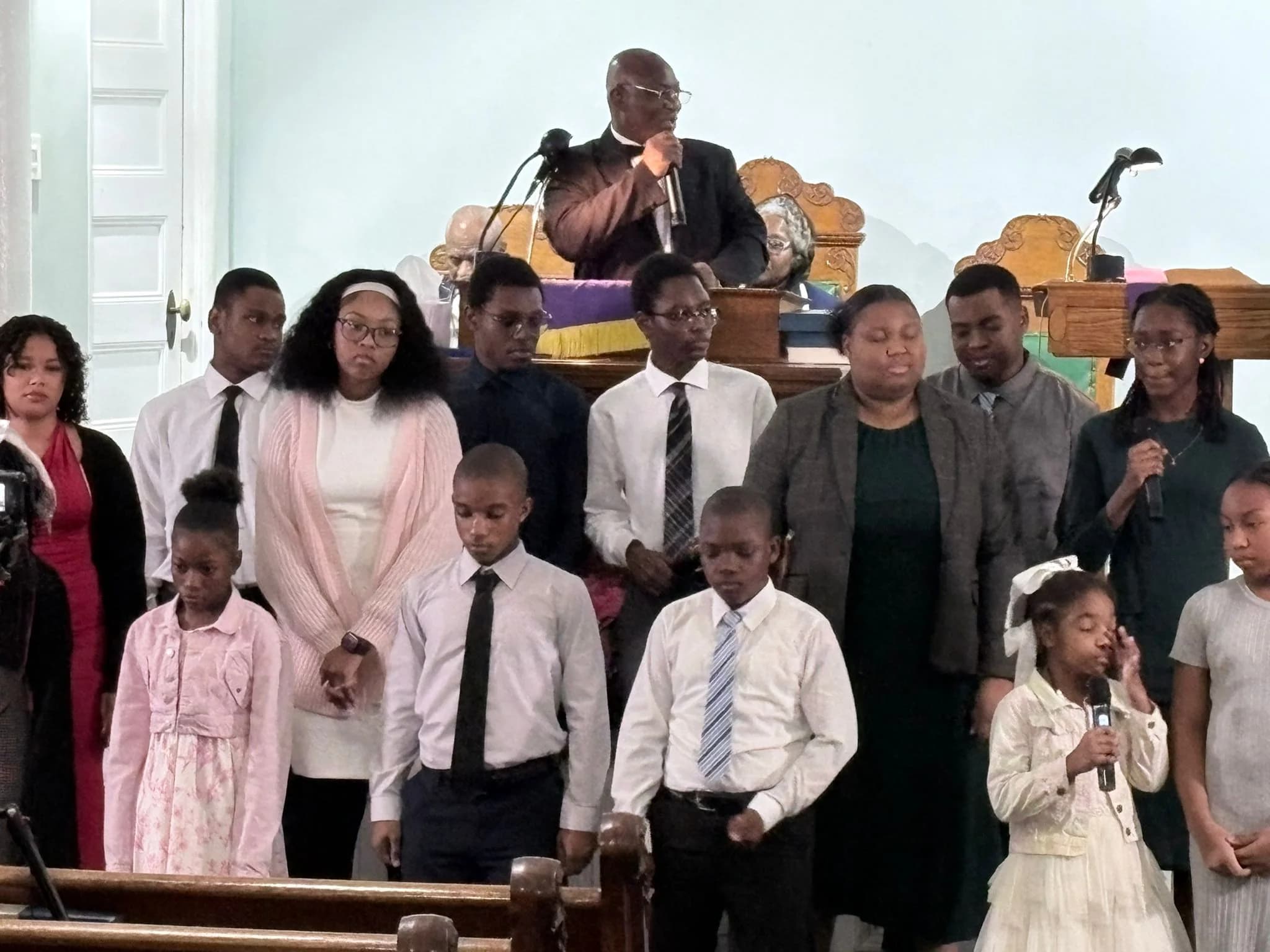 The Christmas choir gathered at the front of the sanctuary